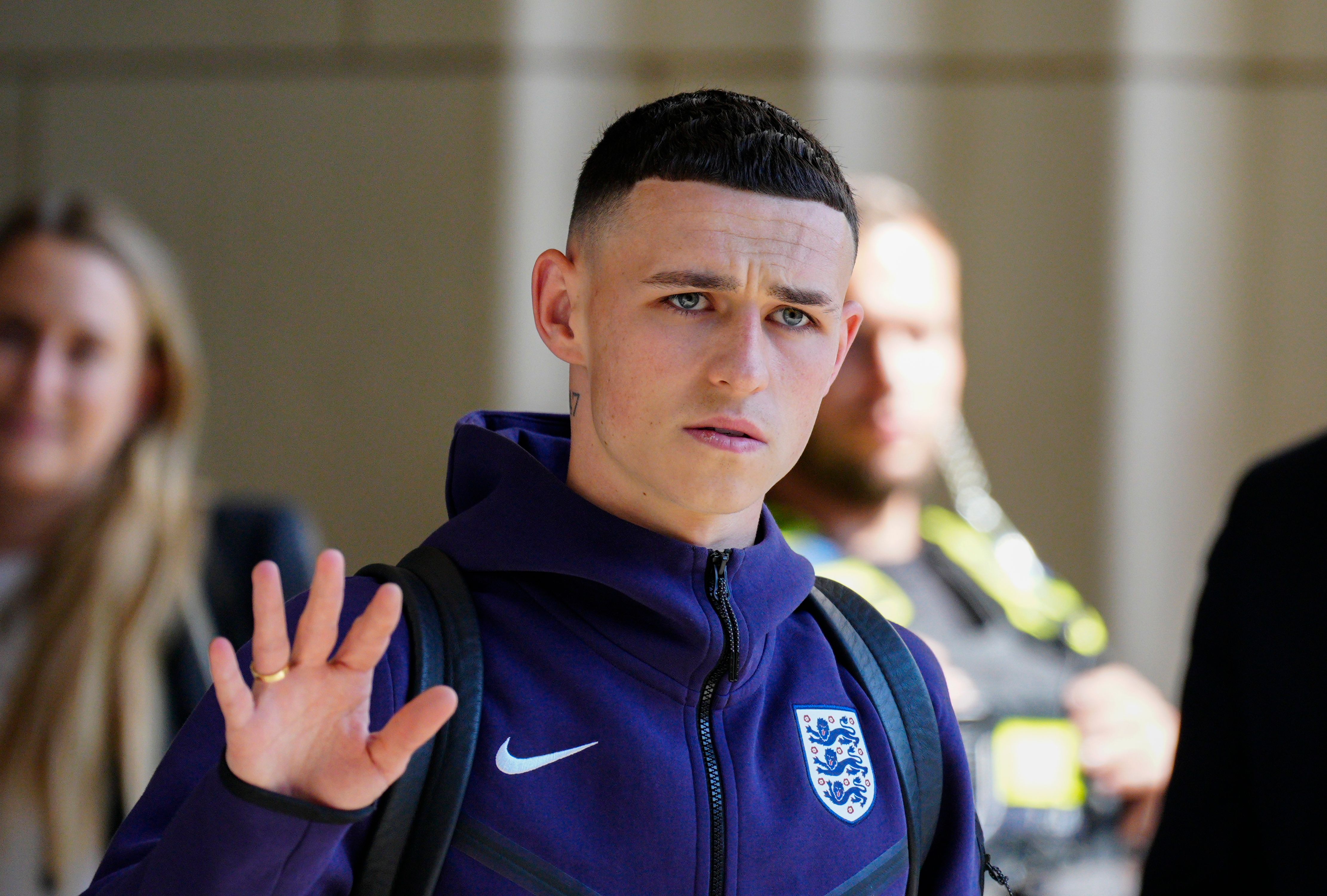 Foden looked shellshocked as he waved to fans