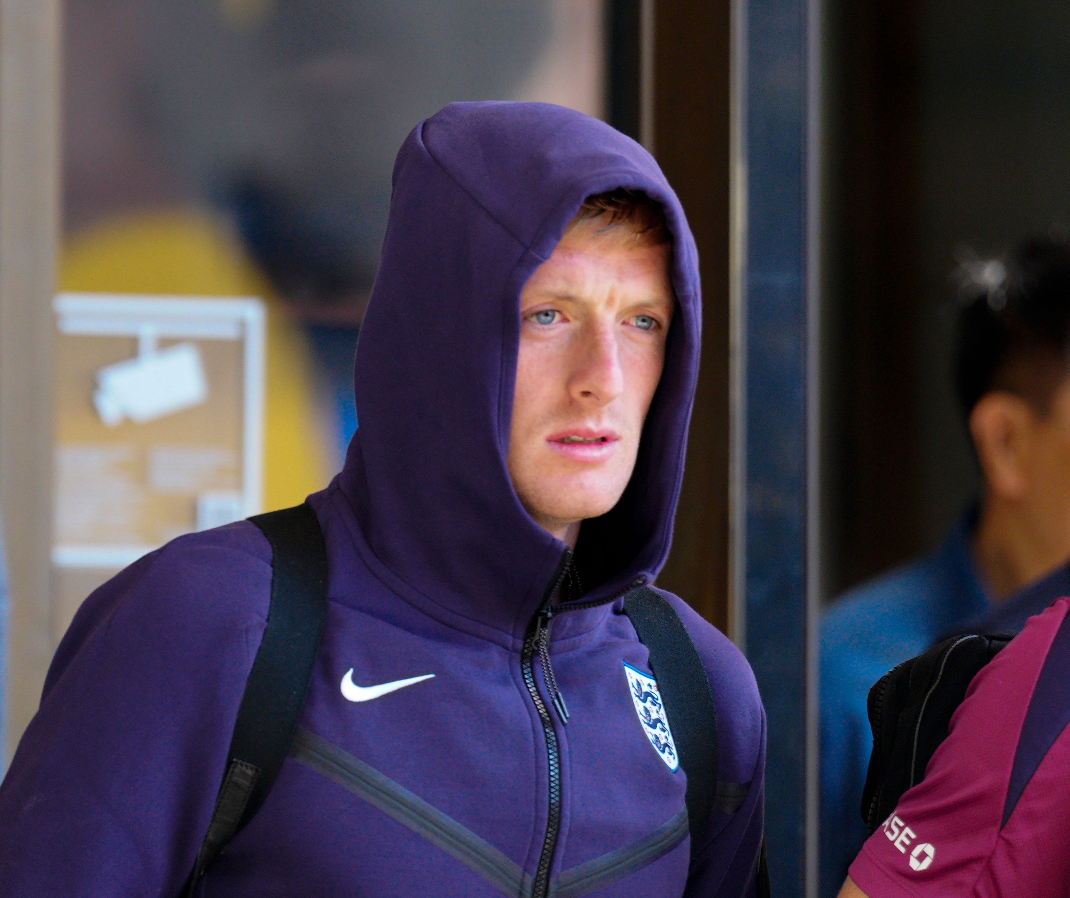 Pickford kept his hood up as he walked to the bus